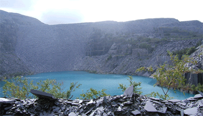The Penrhyn Slate Quarry in Wales - the old quarry with a trout filled dam and a revegetation project underway