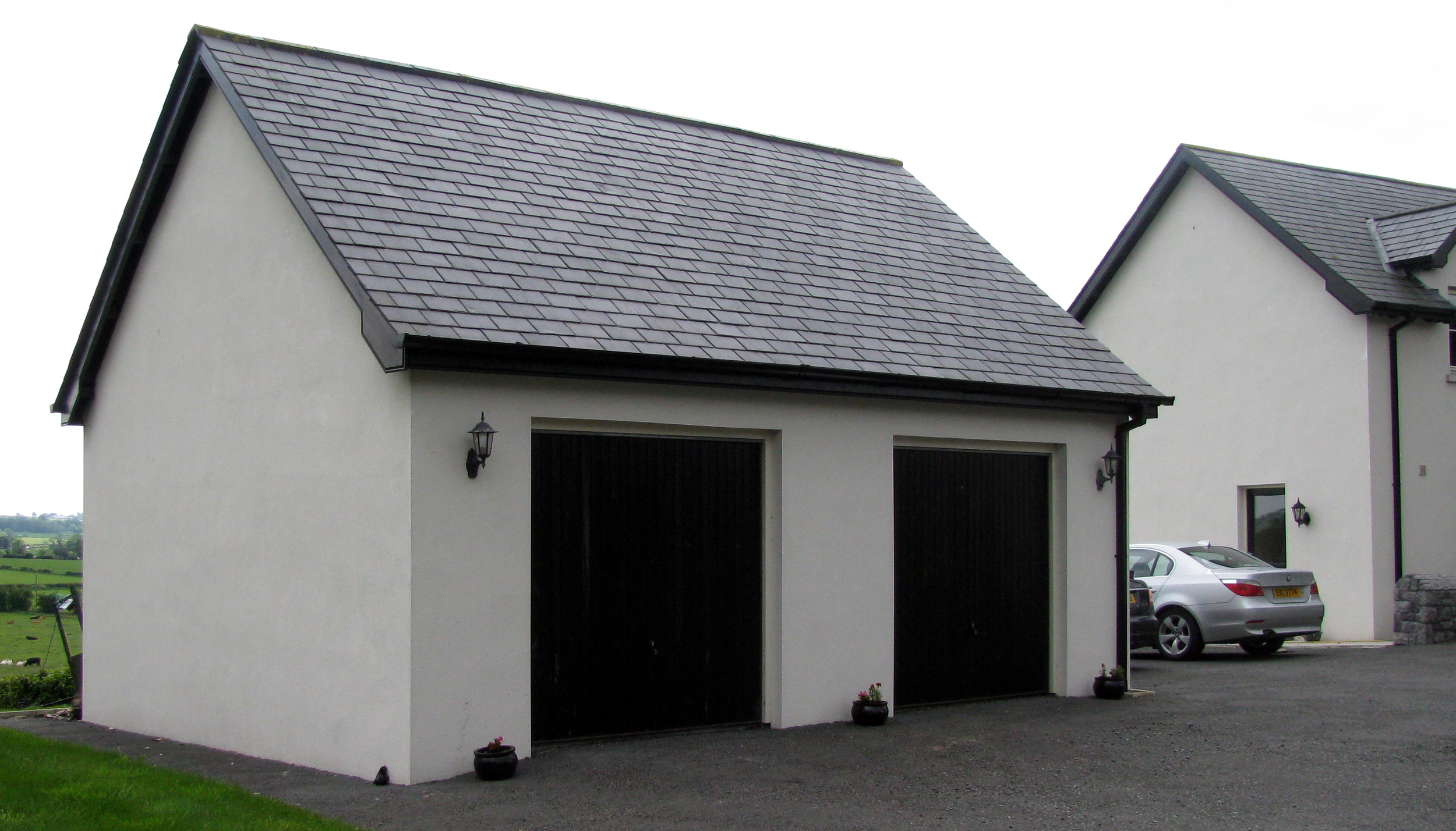   The garage with a Pattini roof in the image above, sits next to a farm house in Northern Ireland overlooking some lush, green pastures and lots of fat cattle!  