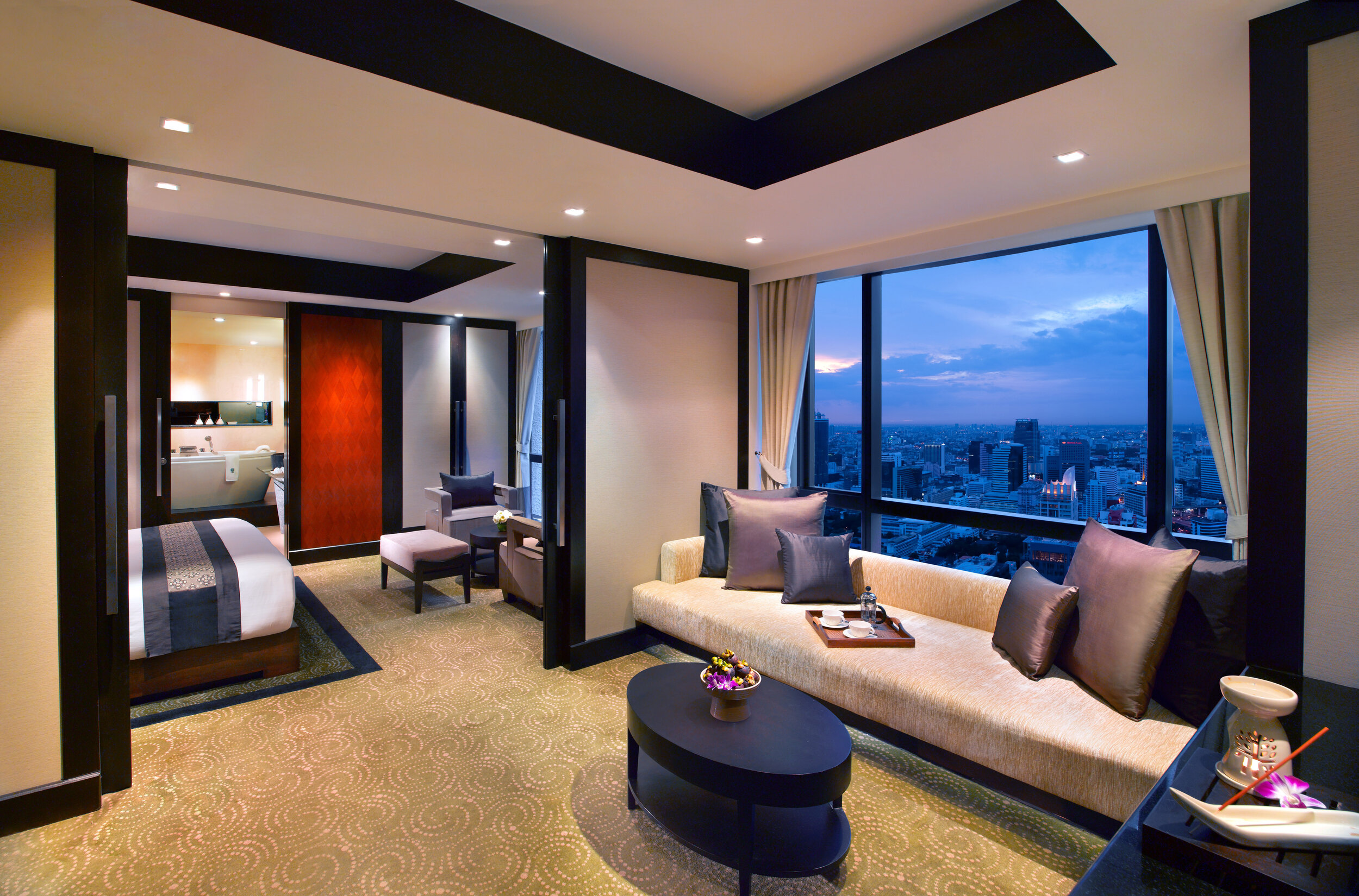 BTTHBK_Room_One Bedroom Suite _Bedroom_Living Room.jpg