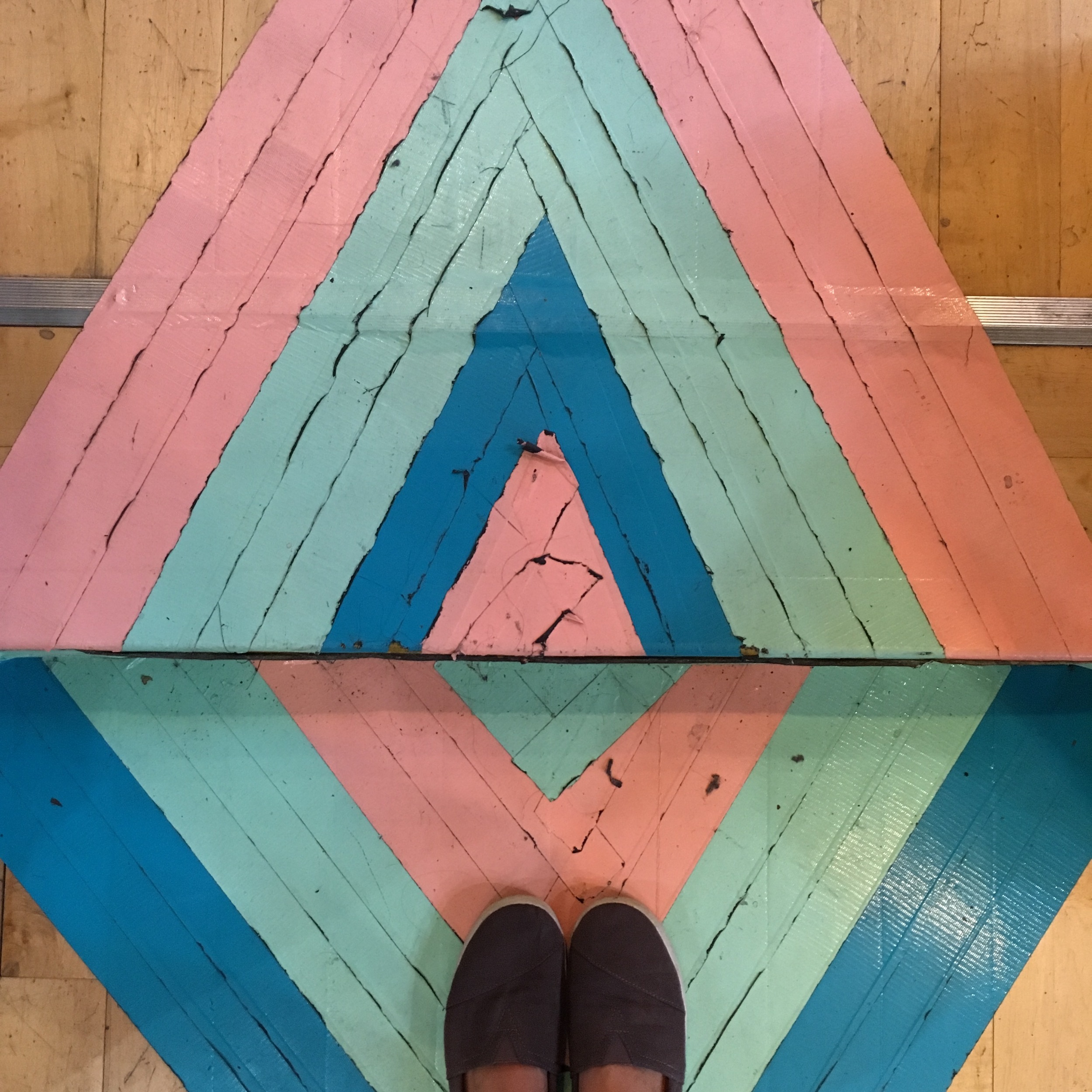 Taped floor at Parts and Labor .