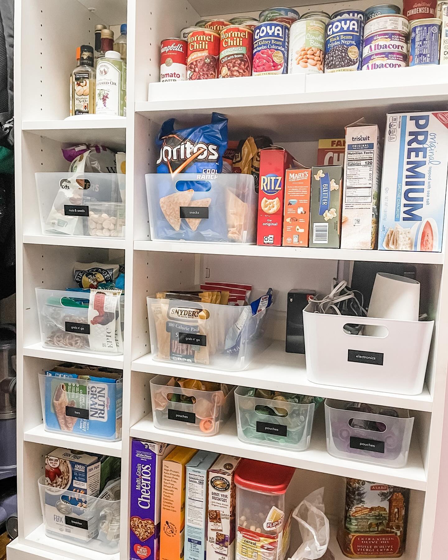 Revamp your kitchen with labeled bins and drawer dividers for a clutter-free cooking oasis! Group similar items together for easy access. 

Making these simple changes can truly make ALL THE DIFFERENCE in staying organized and creating a user-friendl