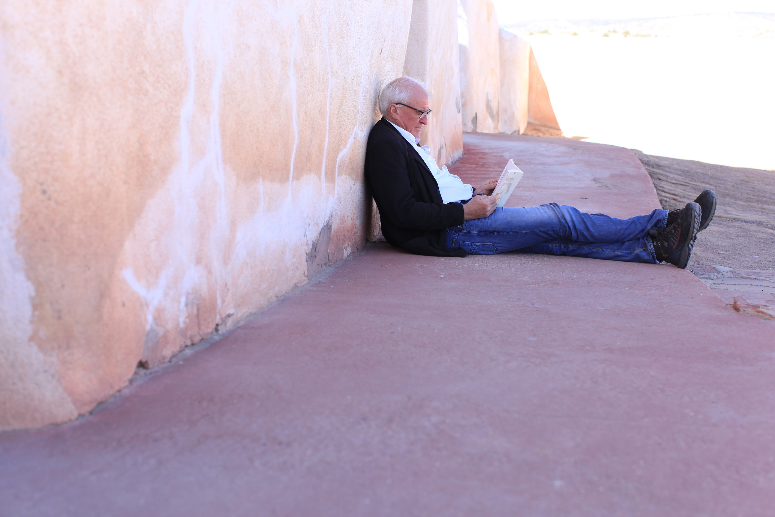  ... whilst Stephen catches up with his reading in the shade of the Mission church. 