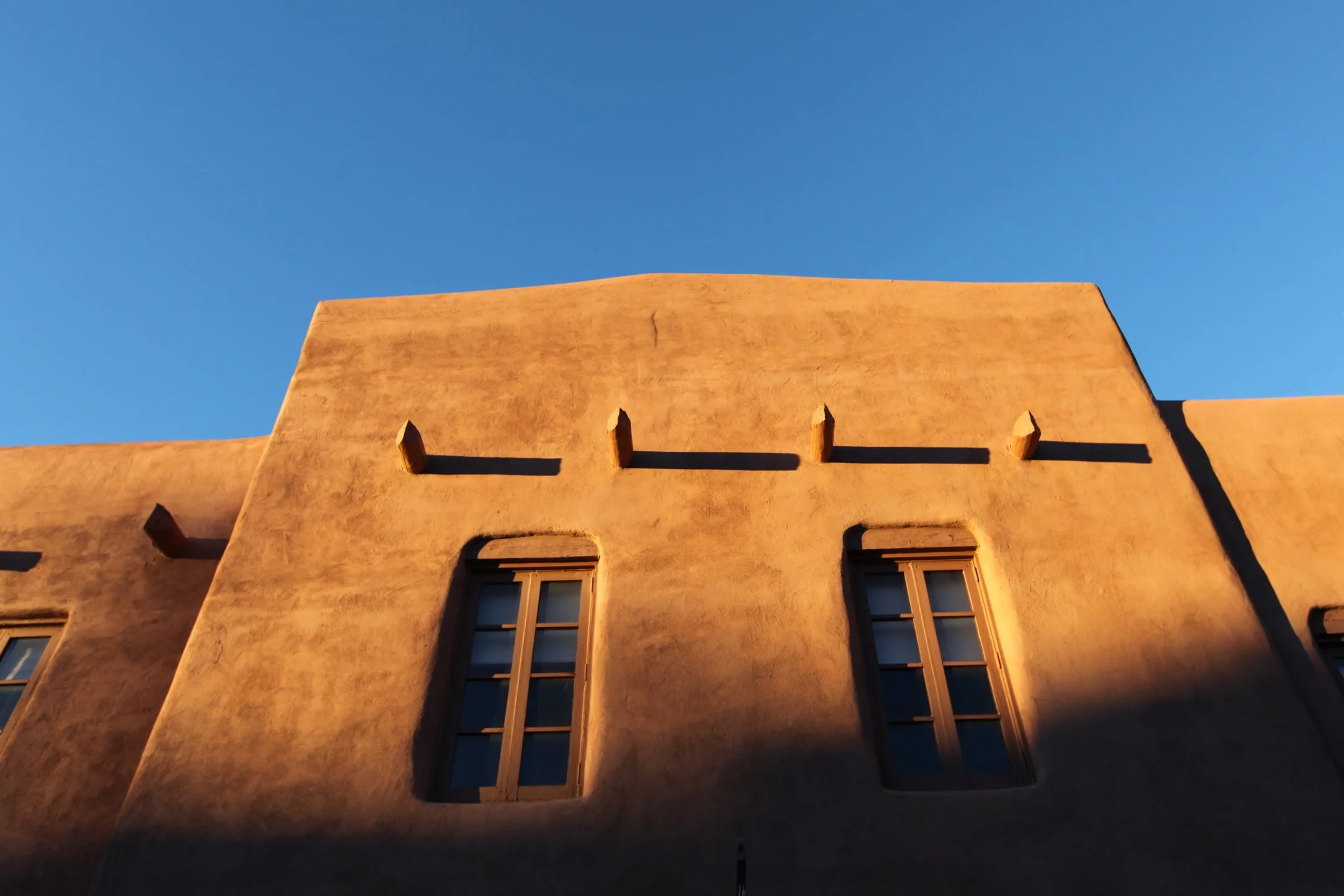 The beauty of sunlight on adobe.