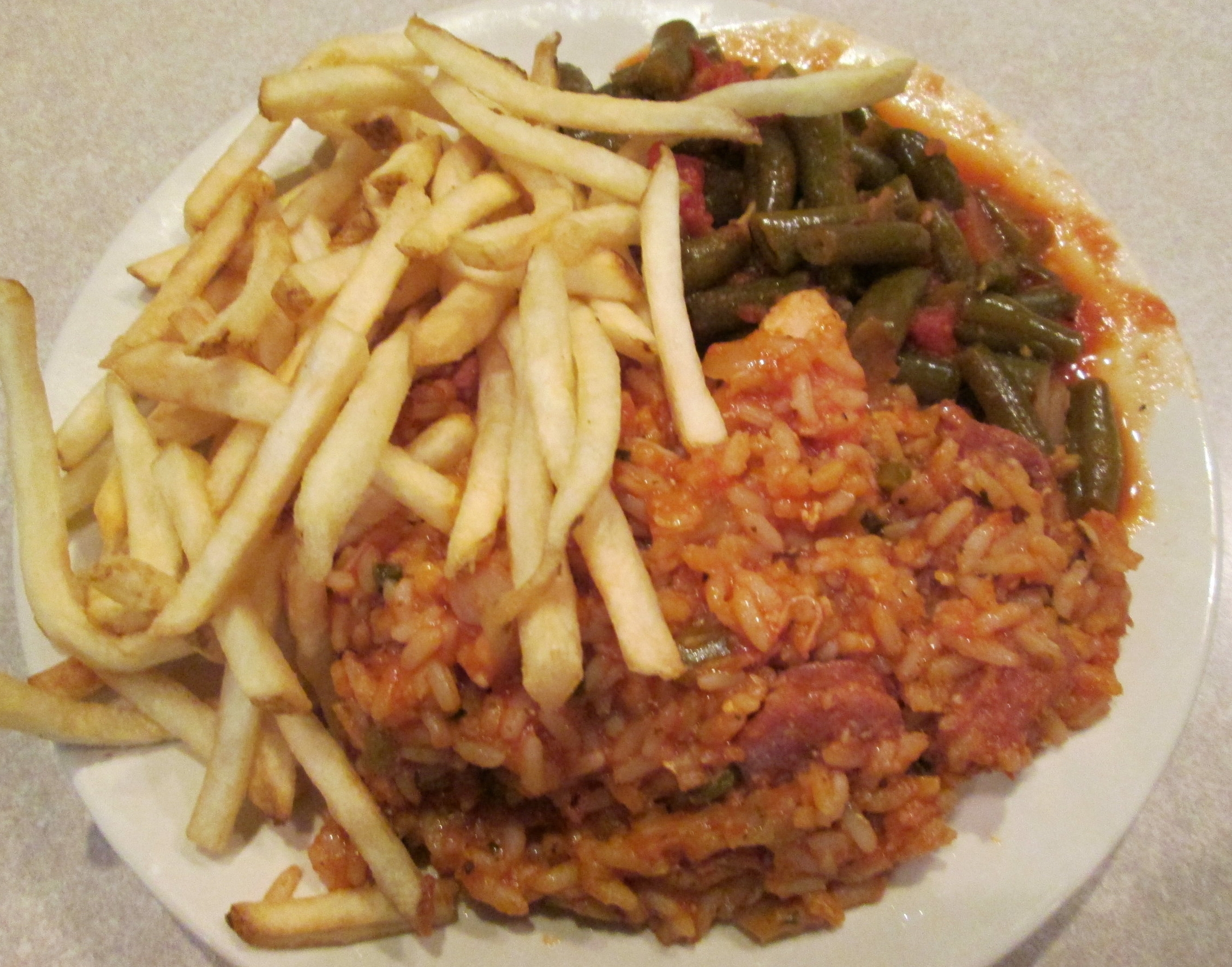  Jambalaya, green beans with tomatoes, and french fries 