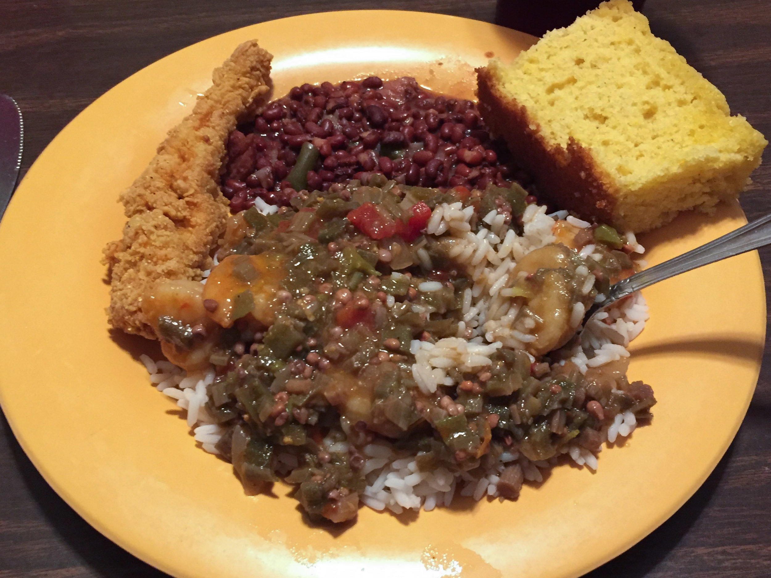  Okra-smothered shrimp, red beans, a side order of fried catfish, and a Southern 'biscuit'. 