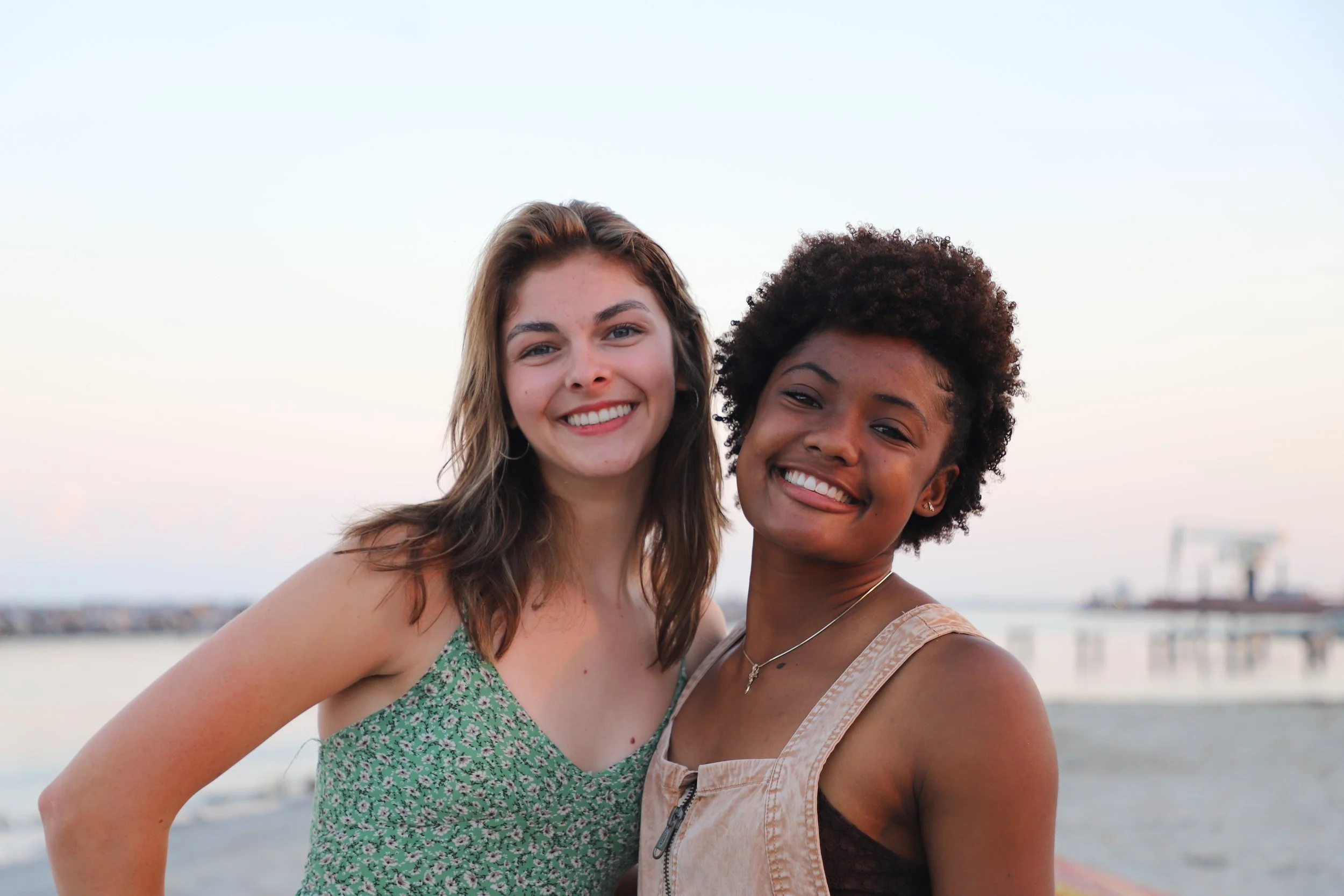  Kamryn and Simone stand together smiling on the Grand Isle coast. This is one of the many opportunities that the group had to bond and truly relax.  