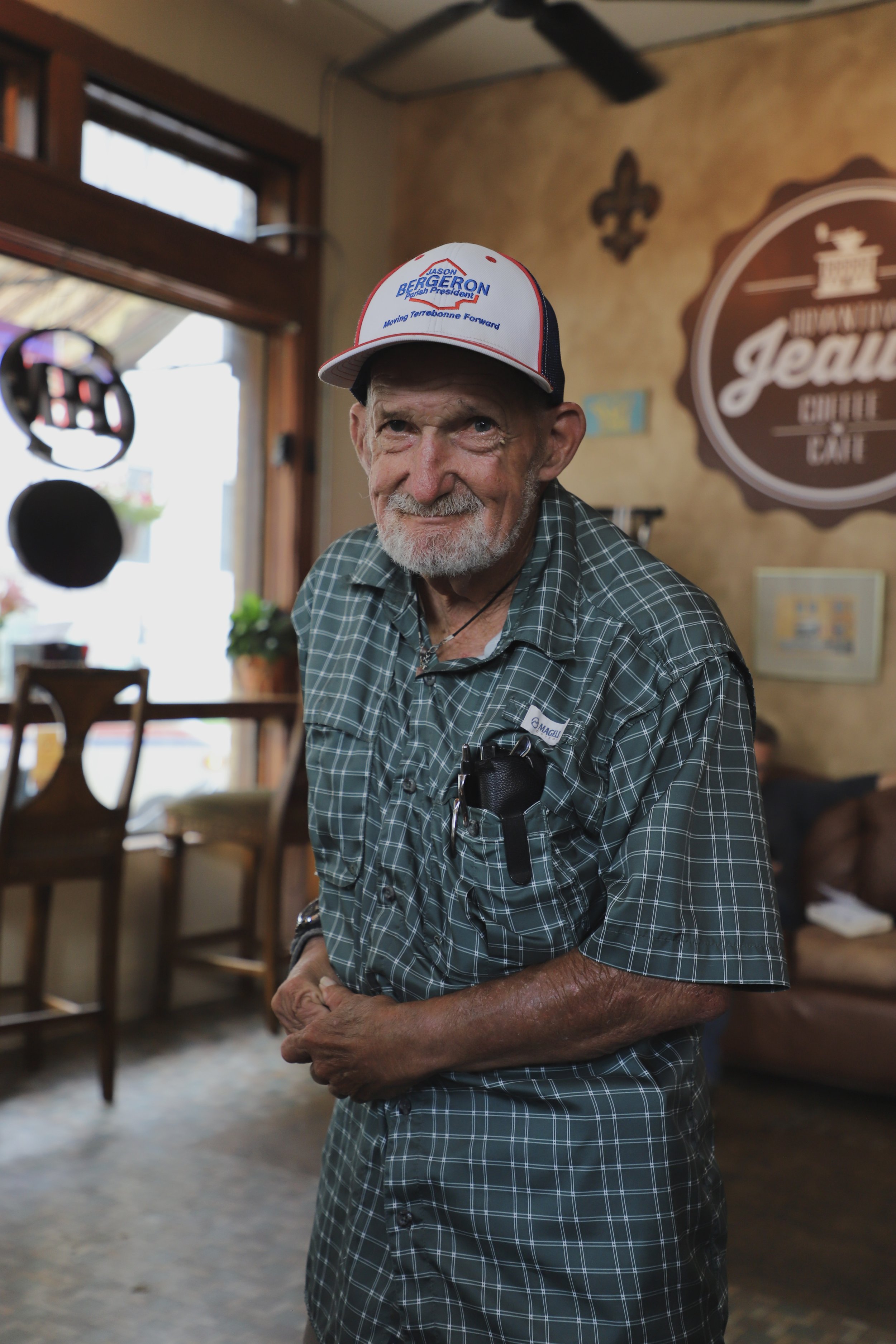  Mr. Jack stands in the Downtown Jeaux Coffee Shop in Houma, LA. Mr. Jack is a regular at this little spot, where he always gets a root beer float, and a longtime resident of Houma, LA. He greeted the students with a smile and an array of stories to 