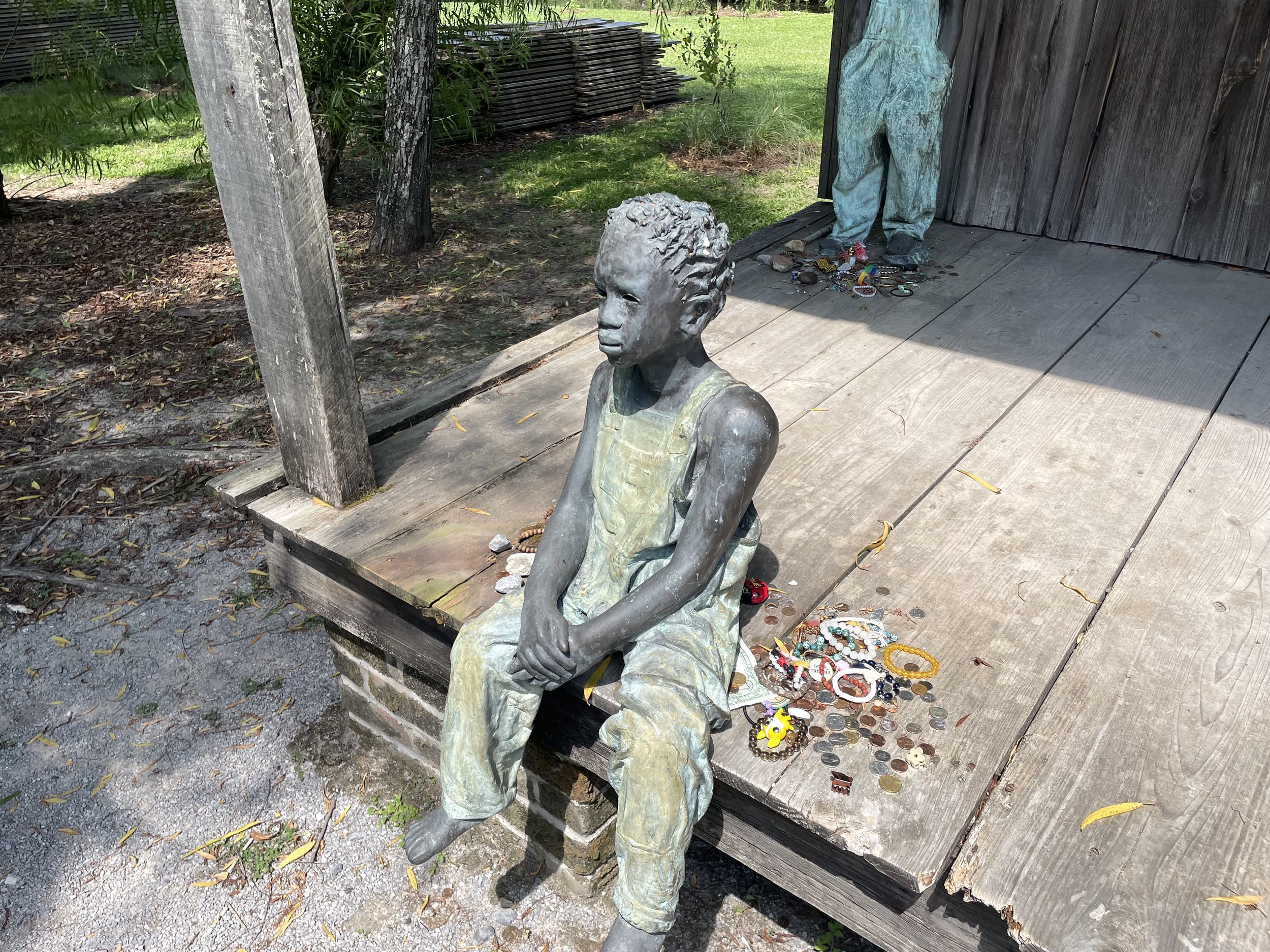 statue w offerings.jpeg
