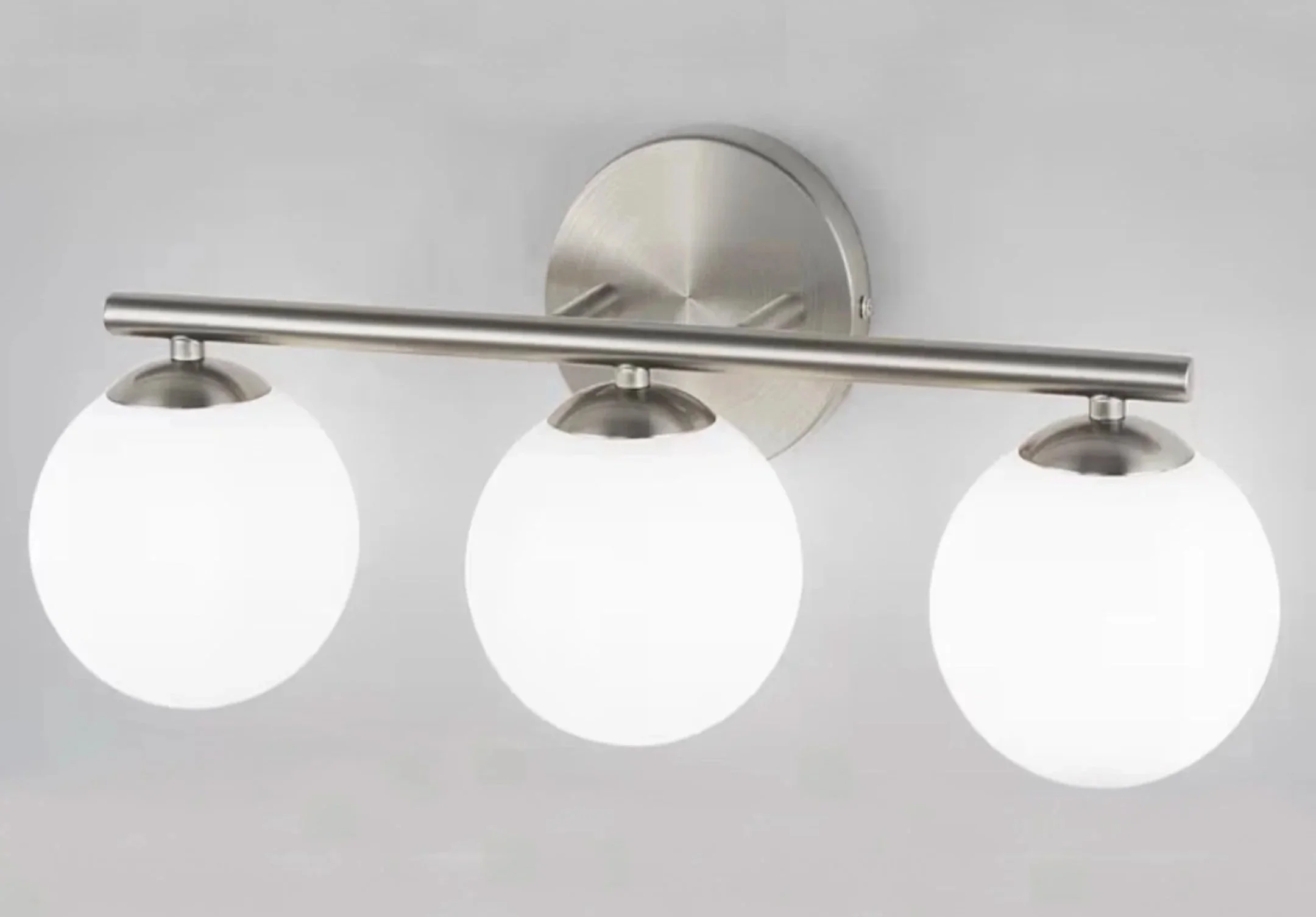 Three globe brushed nickel vanity light