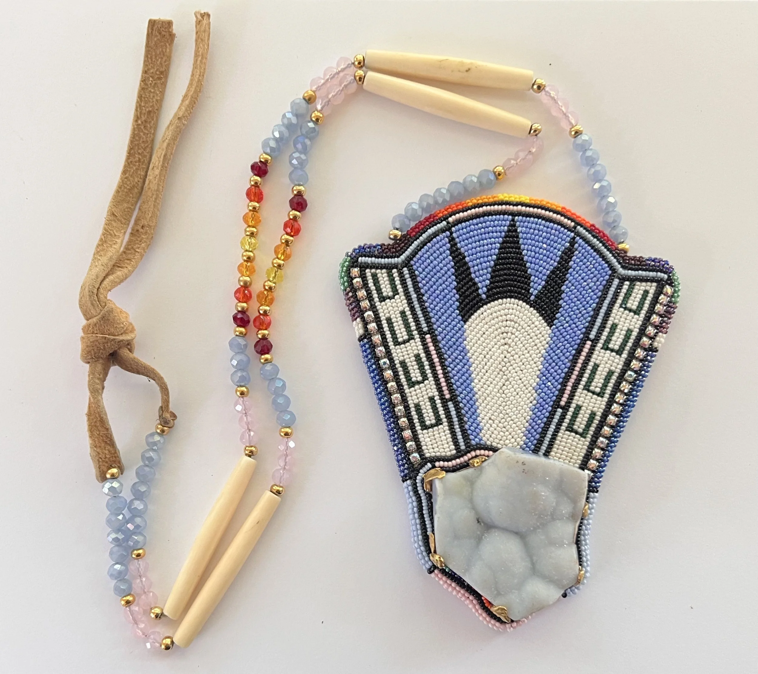 Hand beaded tribal medallion incorporating a rare Ellensburg Blue agate, gifted to Dyanne Williams by a member of Ida Nason Aronica's family following the Cycles public art dedication ceremony