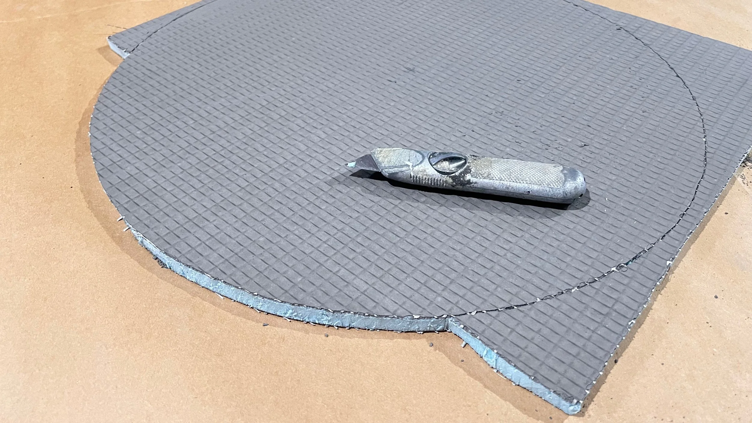 Wedi board cut into circles as substrate for the Cycles public art mosaic panels by Dyanne Williams