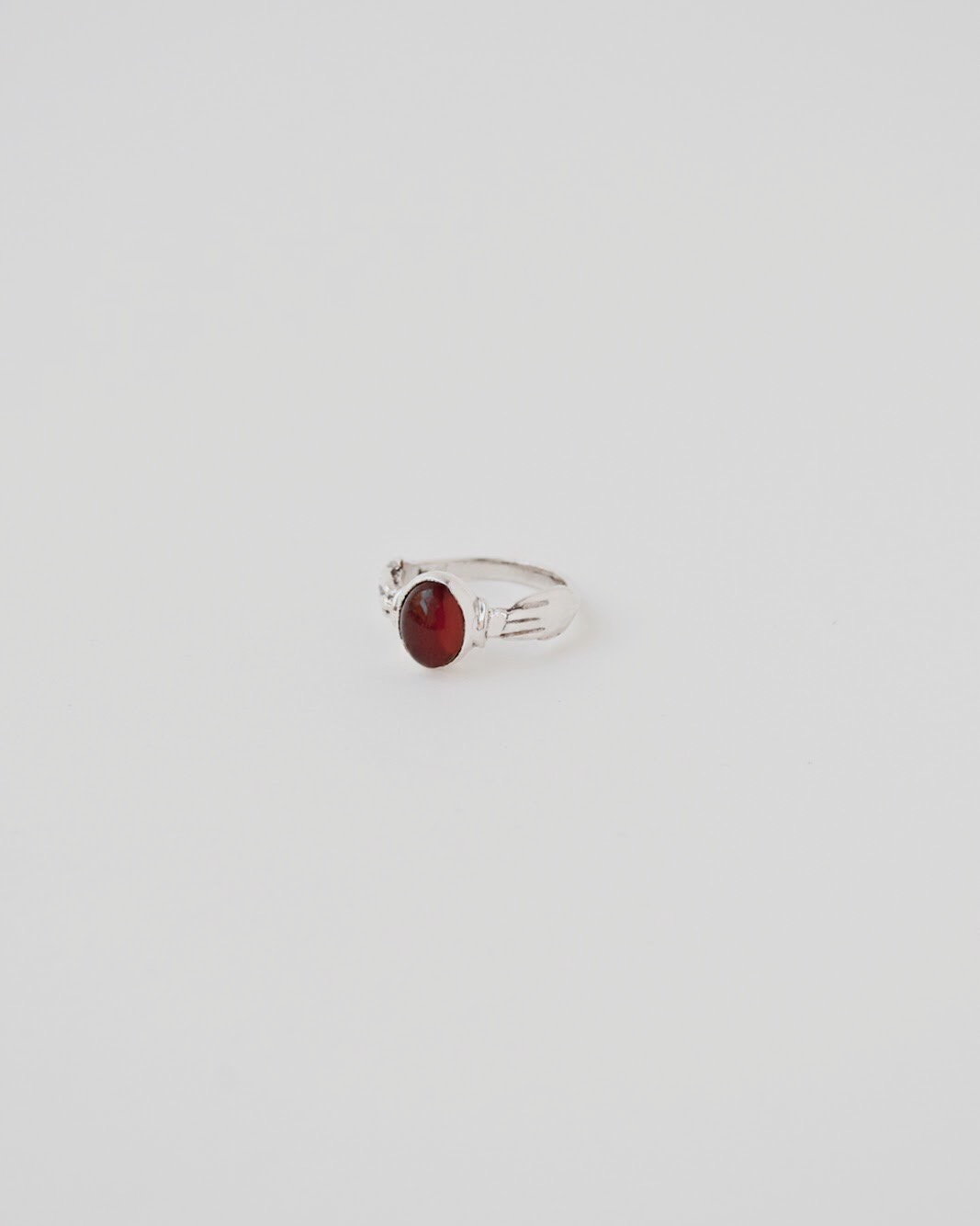 ring_hand_carnelian_silver_bezel.jpg