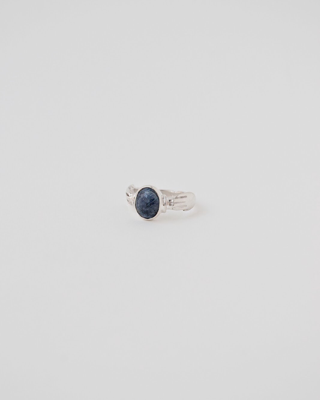 ring_sodalite_hand_silver_bezel.jpg