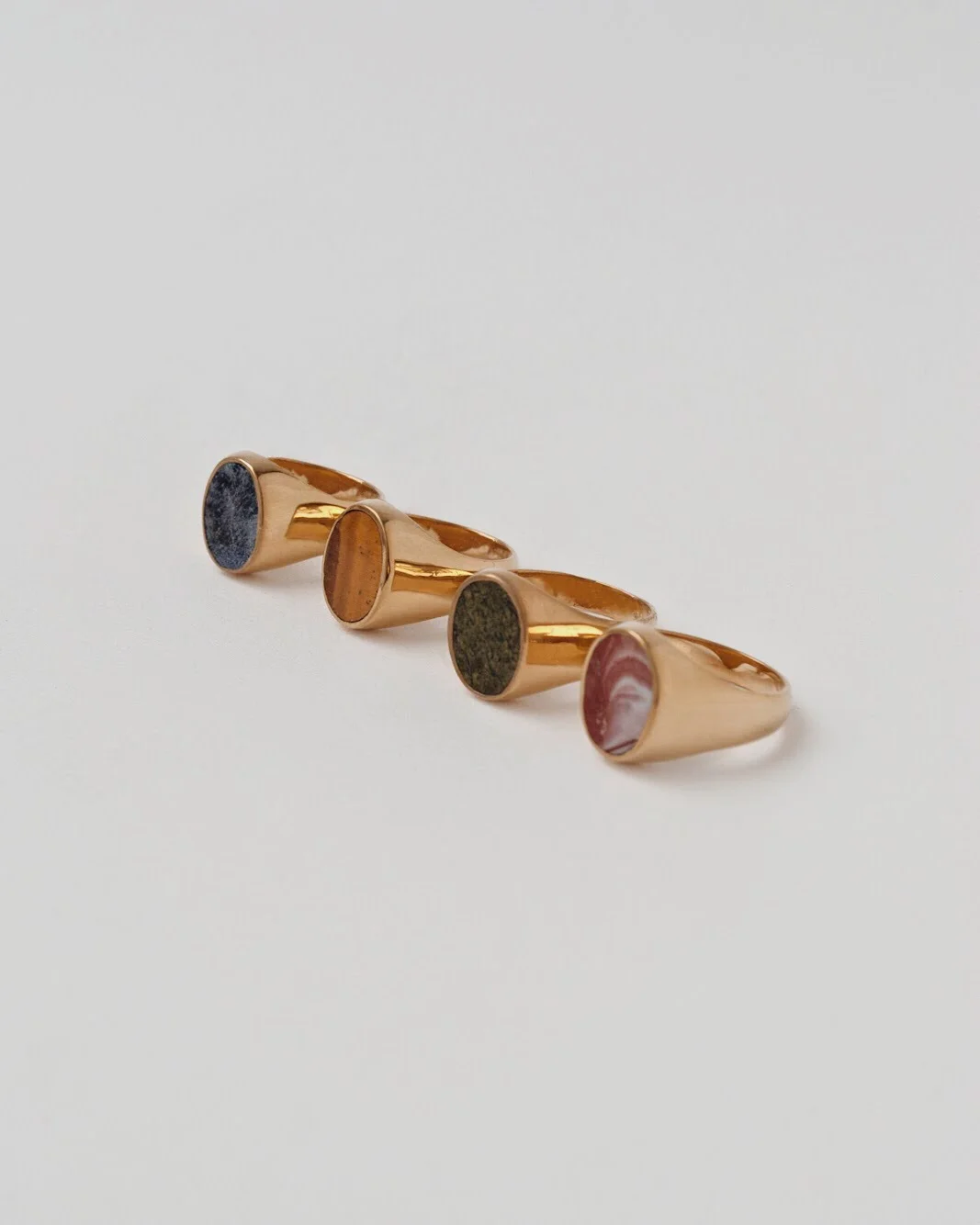 signet_oval_inlay_gold_group.jpg