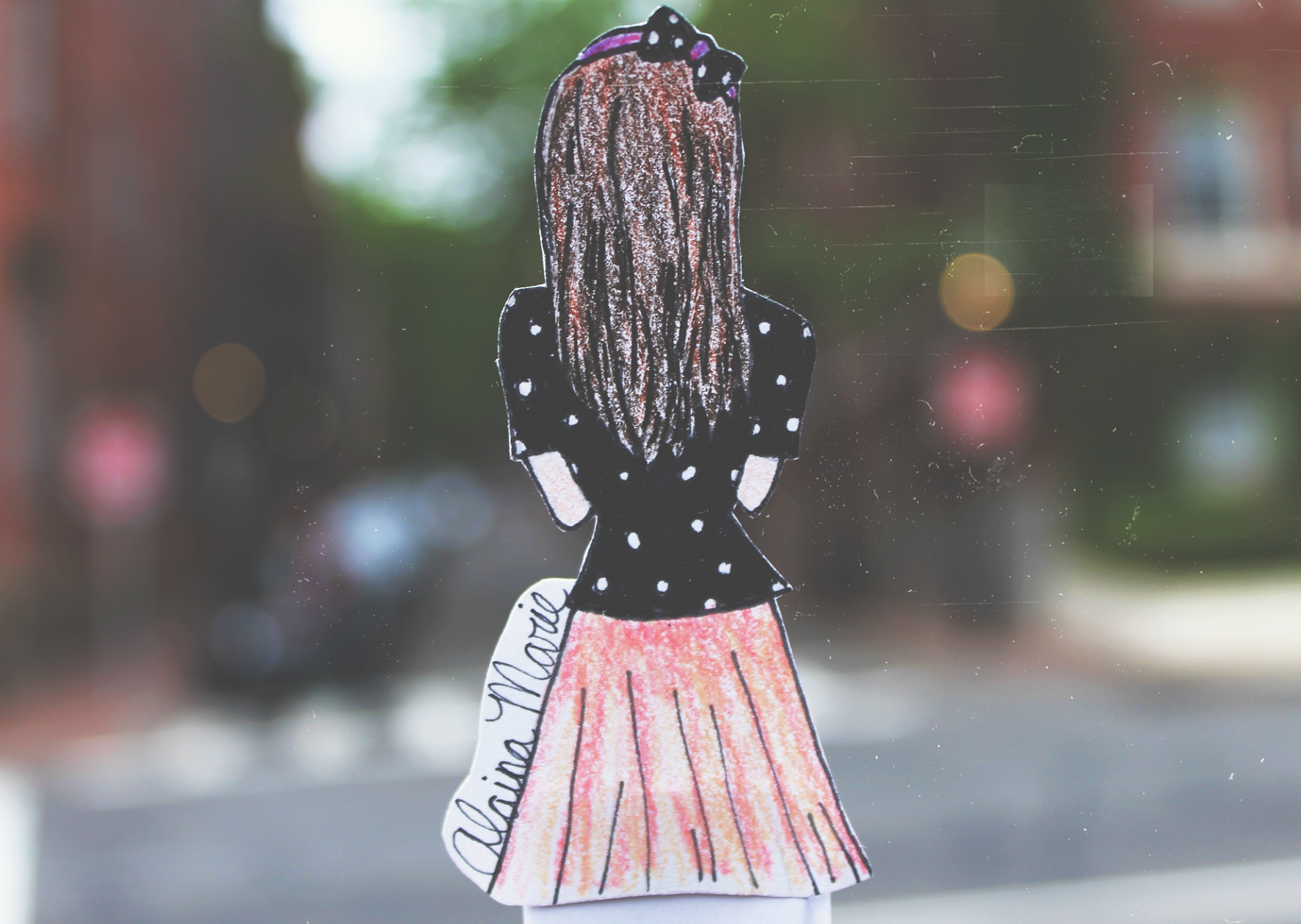 Also, Alaina made this adorable by drawing herself and then taking photos with her DSLR. 