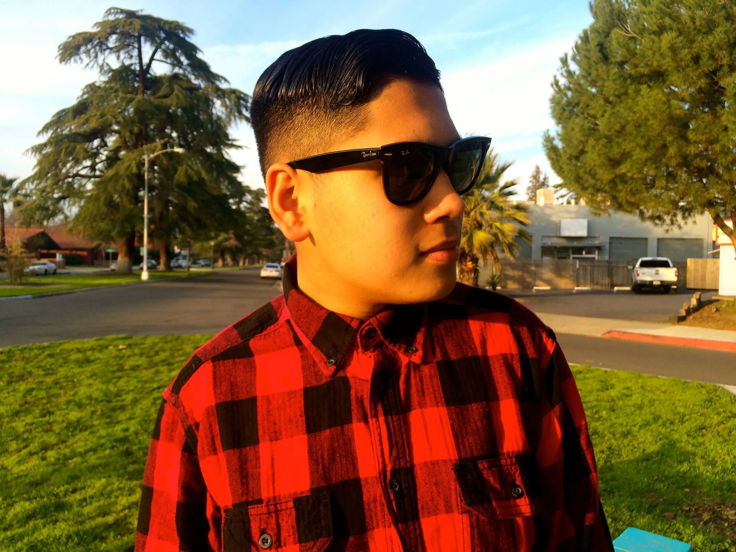 My son, Isaiah using Bay Rum Scented Funky Town Pomade in his hair.