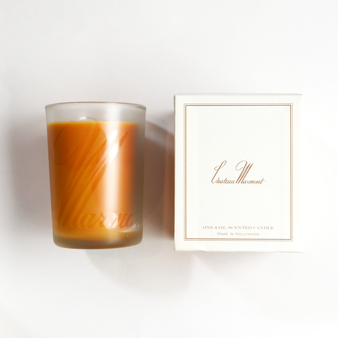“The Alessandra candle is a private blend of florals and spices, gardenia and vanilla that reminds us of one of favorite hotels. Honey-amber colored soy wax fills a frosted glass etched with Chateau Marmont's original logo.” - Clare V