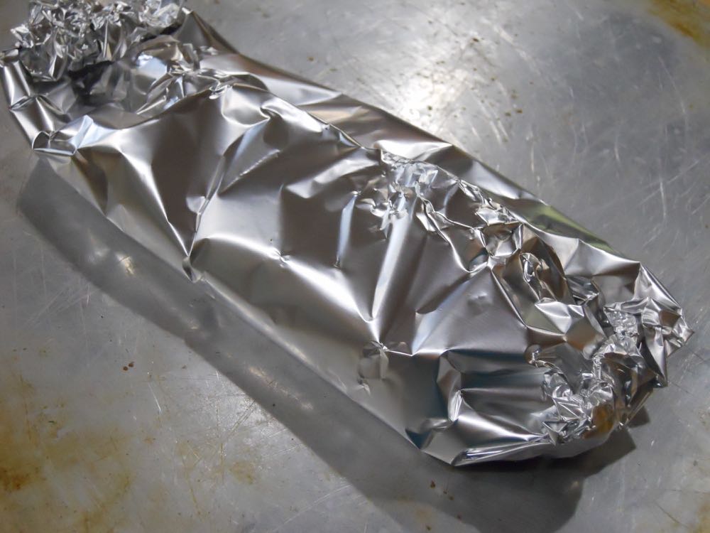Fold the salmon and mixture tightly-sealed in the aluminum foil to seal in flavor as it bakes.