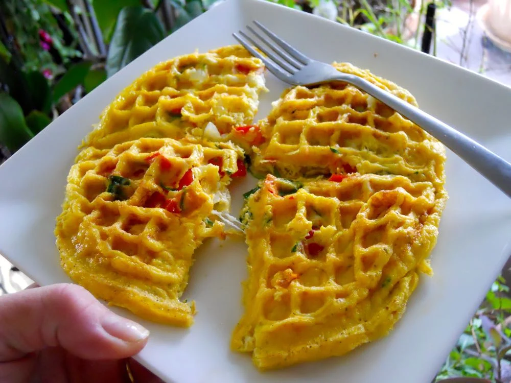 Egg omelet right out of the waffle iron and ready to eat. I freeze half for another meal.