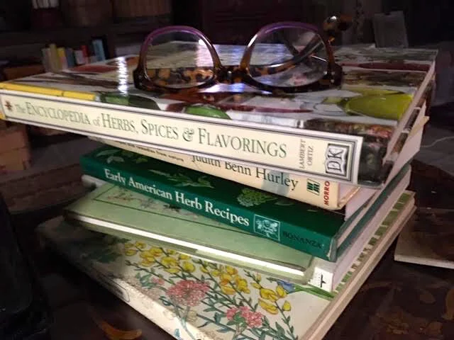 The start of my winter reading stack has a decided theme - herbs. (Photo by Charlotte Ekker Wiggins)