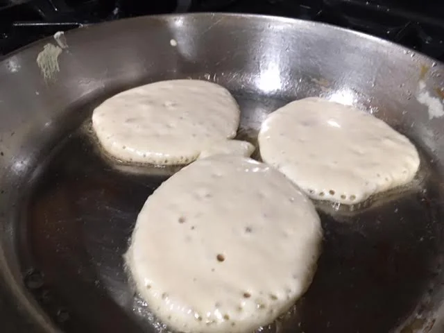 Bubbles are the sign to flip the pancakes to cook on the other side. (Photo by Charlotte Ekker Wiggins)