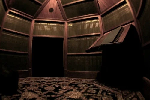 Subterranean quarter-scale library with self-reading book. Carpentry: Joe Ertl-Reich