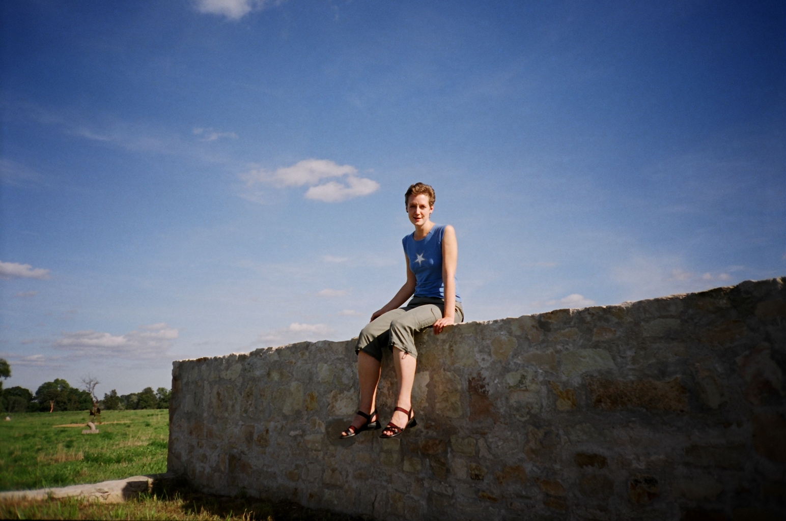 Artist Laura Feldberga on her object Bed (2004). Stone, soil. Pedvale Open-Air Art Museum, Latvia. Photo: © Alise Tifentale.