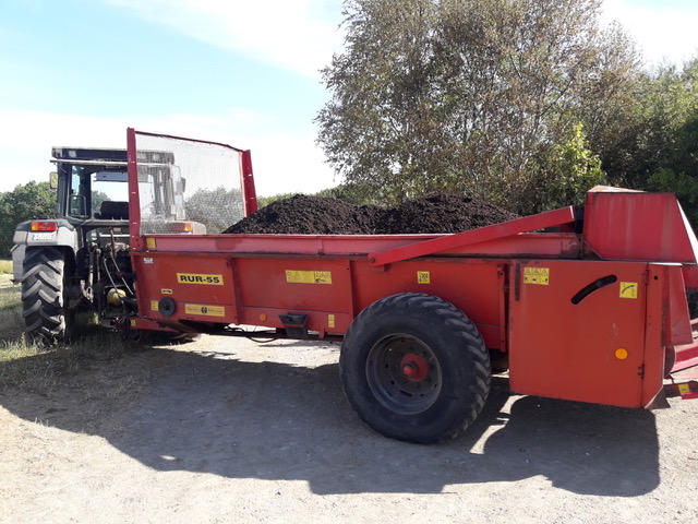 Spreading compost on the fields