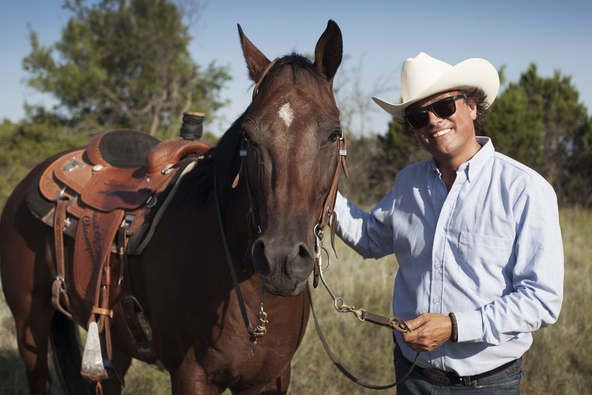 Ep3 Russ with his horse on the ranch.jpg
