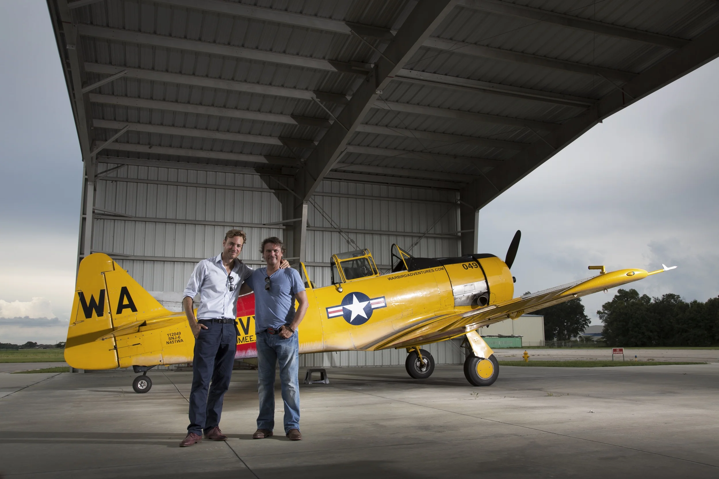 Ep5 Charley & Russ next to the WWII Fighters they dogfight in.jpg