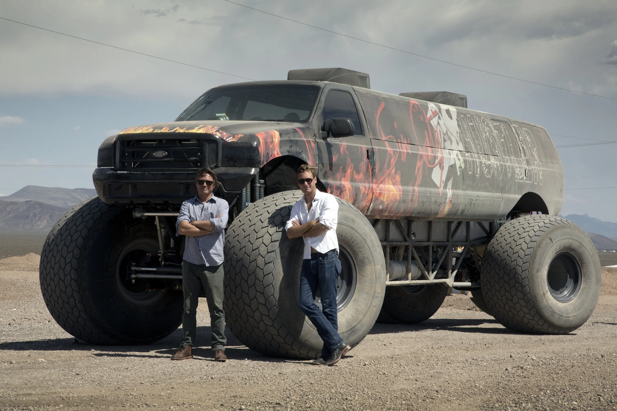 Ep7 Charley & Russ beside Monster Truck in Vegas.jpg