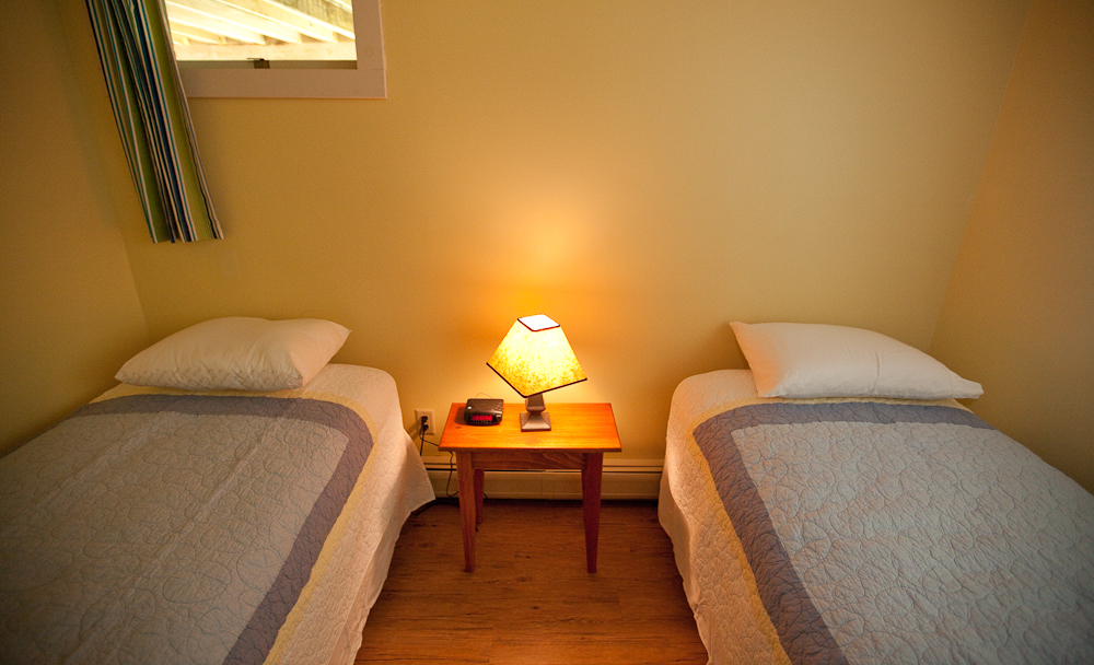 Twin room that leads from the queen bed with yellow cover