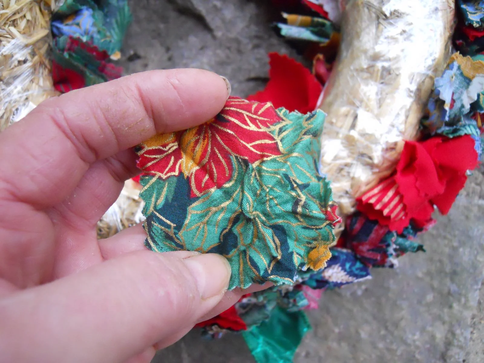 Pinking shear fabric edges give fabric squares an easy finish and add texture to the wreath.