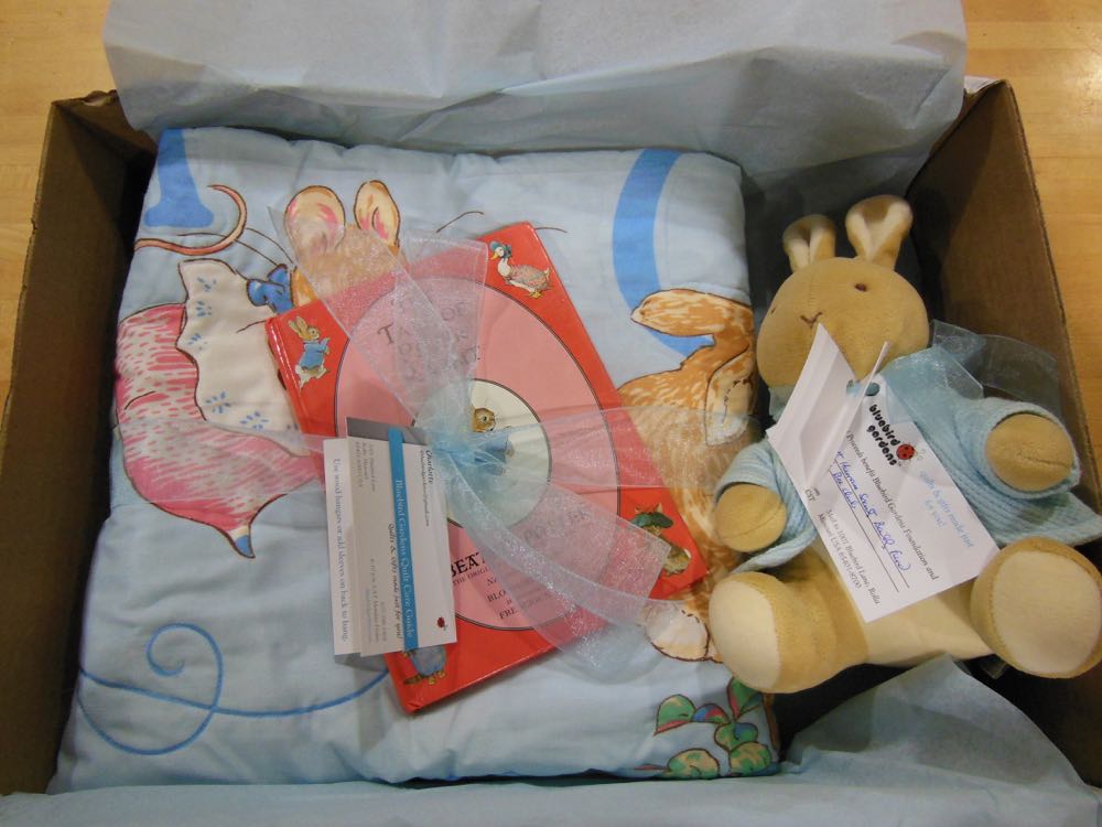 Our custom Peter Rabbit Crib Quilt gift set ready to ship for a shower in New York.