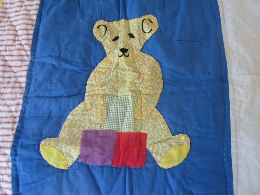 This applique bear was the inspiration for the bear I finally found for the gift set.