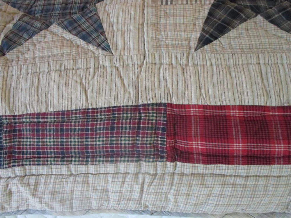 The bottom All Stars Handmade Quilt throw border is also a good place to personalize.