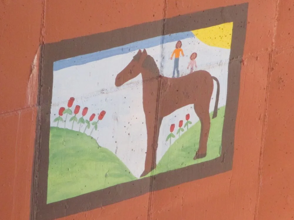 My, those are very tiny flowers and people!