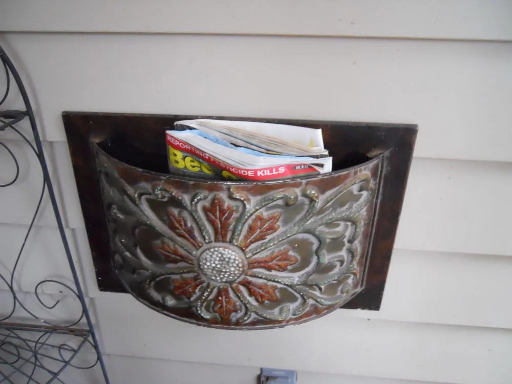 Better than a basket, this metal basket is where I can leave magazines and other reading material.
