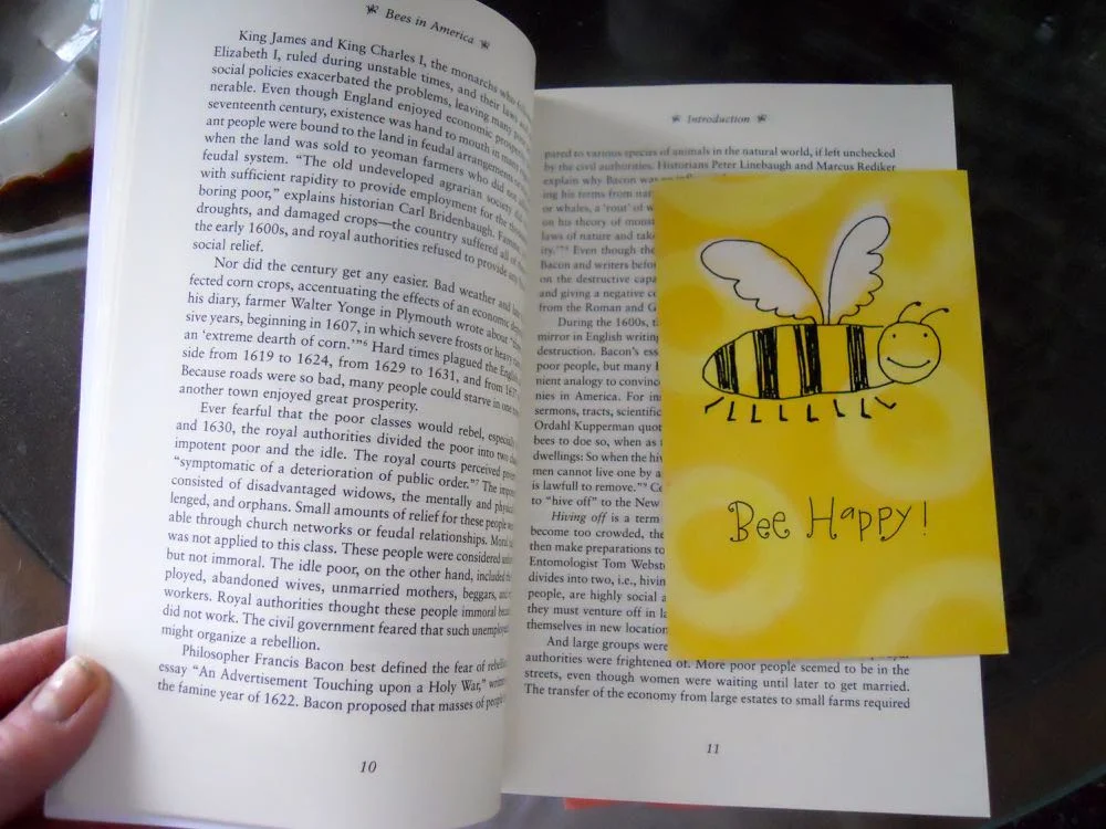 One of my favorite magnet book marks was made out of this little "bee happy" thank you card.