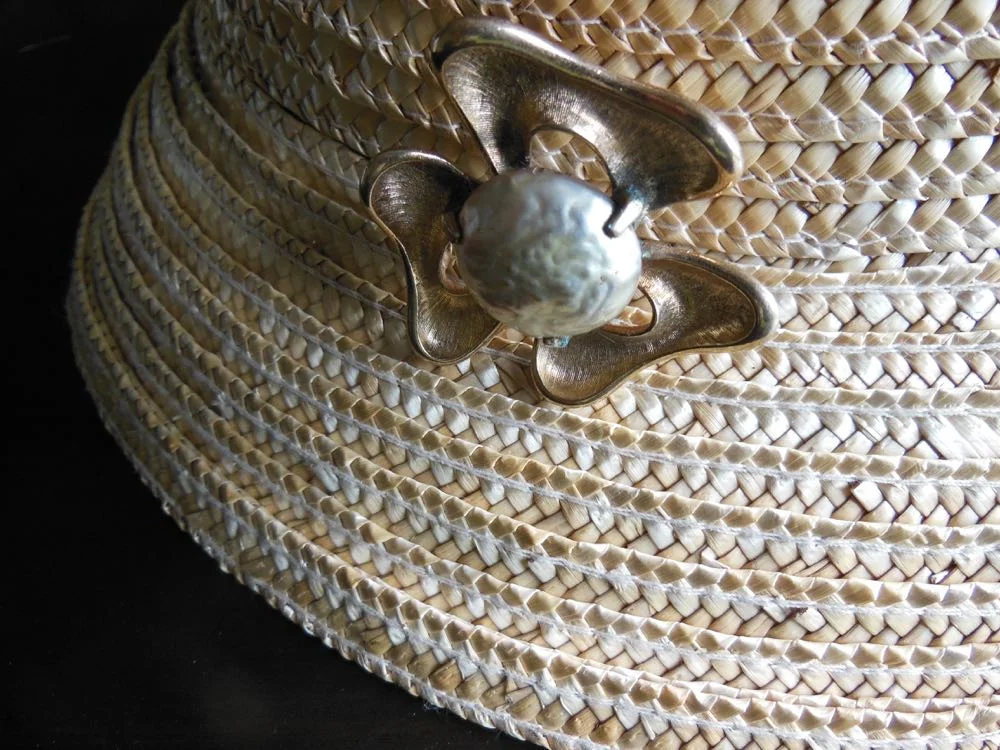 One of my favorite combinations, this pearl pin with a summer straw hat. (Photo by Charlotte Ekker Wiggins)