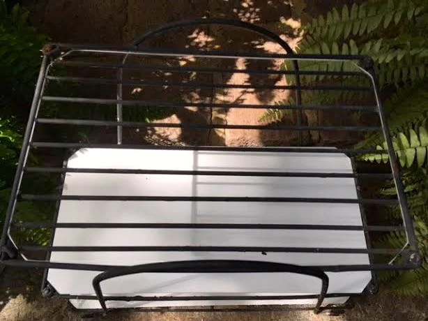 Custom cut plexiglass will cover each of the wire plant stand rungs to make them solid.