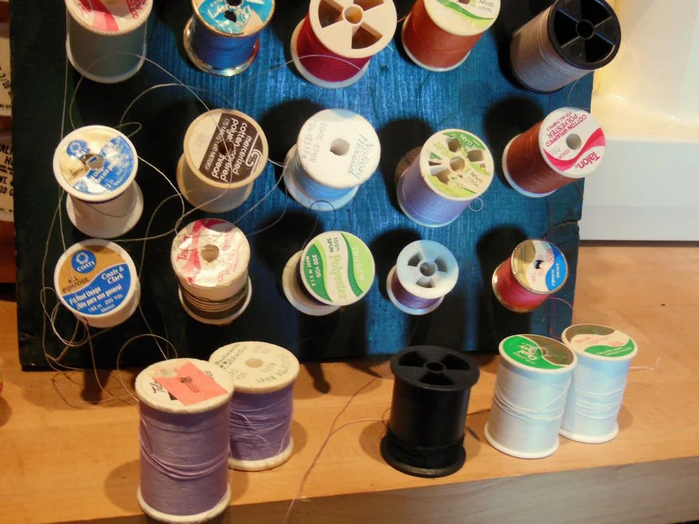 Spools of thread waiting fo their turn on the organizer. (Photo by Charlotte Ekker Wiggins)