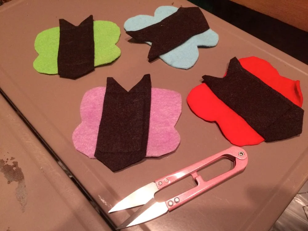 Different-colored butterfly pieces ready to sew. (Photo by Charlotte Ekker Wiggins)