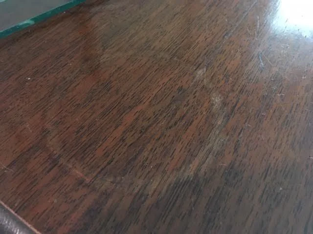Water ring damage to a wood radio cabinet can be fixed two ways. (Photo by Charlotte Ekker Wiggins)