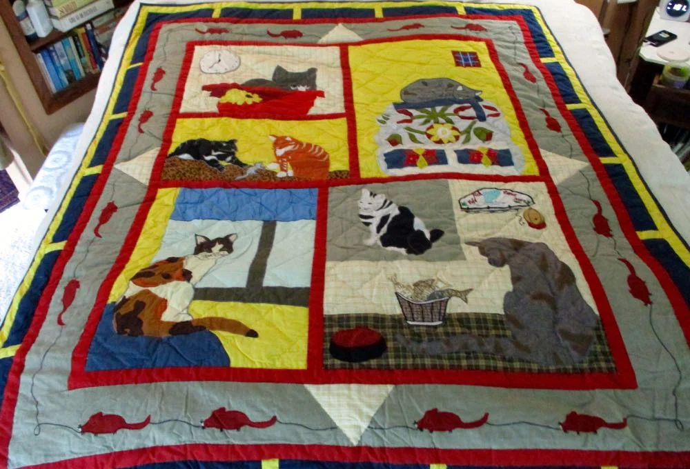 This all cotton Cat Mischief Lap Quilt would make a charming quilted wall hanging. (Photo by Charlotte Ekker Wiggins)