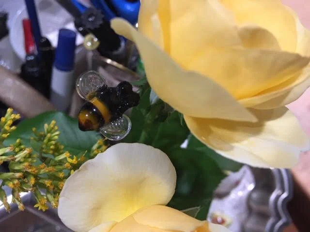 I found a use for this charming handblown glass bee, to keep my flowers company. (Photo by Charlotte Ekker Wiggins)