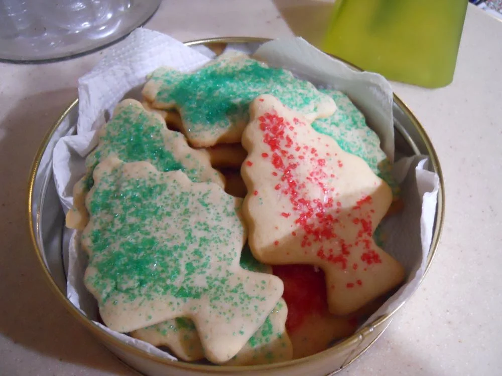 Honey sugar cookies sprinkled with sugar crystals before baking, now baked and packed for gifts.
