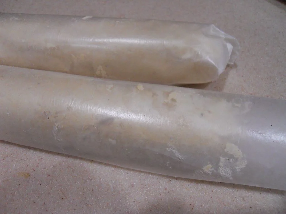 Fold corners at each edge, then place the cookie dough in wax paper in freezer.
