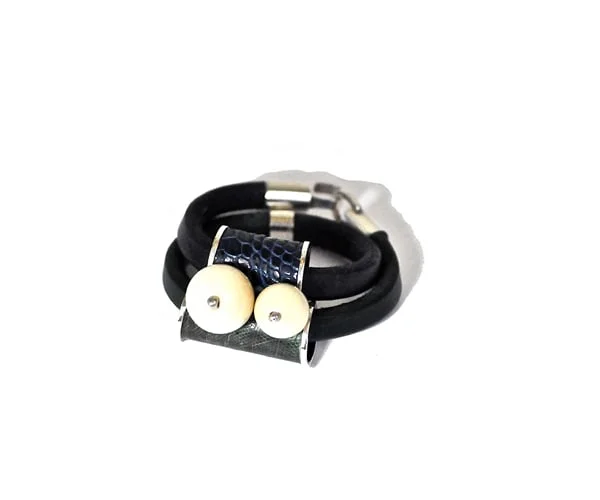 ivory,leather,lizzar skin and silver bracelet .jpg