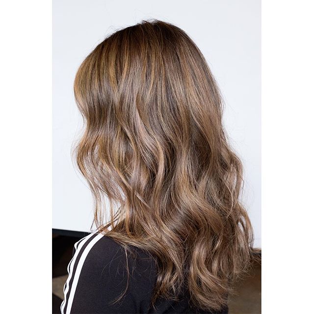Work in progress! My client had a botched balayage done about two months prior. I had her use #olaplex3 a few times between our consultation and the correction. Highlights with #olaplex1, lowlights, #olaplex2, fill, root smudge, gloss and a trim. ➡️ 